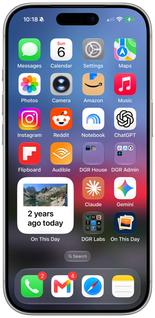 An iPhone Home Screen with the On This Day widget showing a lake photo captioned 2 years ago today